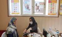 برگزاری میز خدمت توسط تیم جهادی 